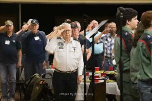 Roll Call Fort Worth Veterans salute during National Anthem May 2023