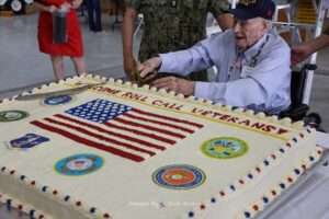 Roll Call Fort Worth WWII Veteran Bill McIntyre cuts the cake at luncheon on NAS Fort Worth JRB April 2023