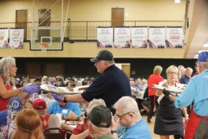 Roll Call Fort Worth volunteers serve meals to veterans at luncheon June 2023